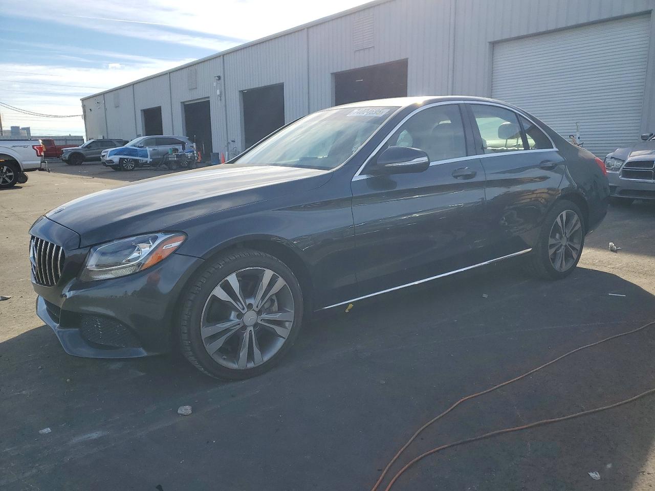 2015 Mercedes-Benz C-Class VIN 55SWF4KB4FU032554 COPART salvage auction — Front End, FL - CERT OF TITLE SLVG REBUILDABLE, sold $4,100 on 2026-07-06 (photo 1)