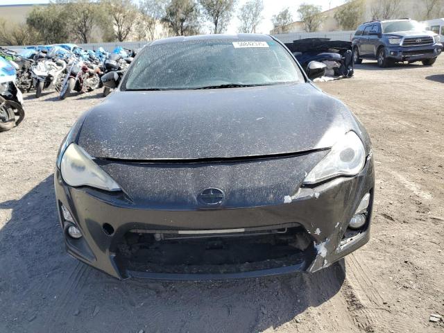 2014 Toyota Scion VIN JF1ZNAA12E8706567 COPART salvage auction — SIDE, Nv - Salvage Title, sold $1,600 on 2026-07-03 (photo 5)