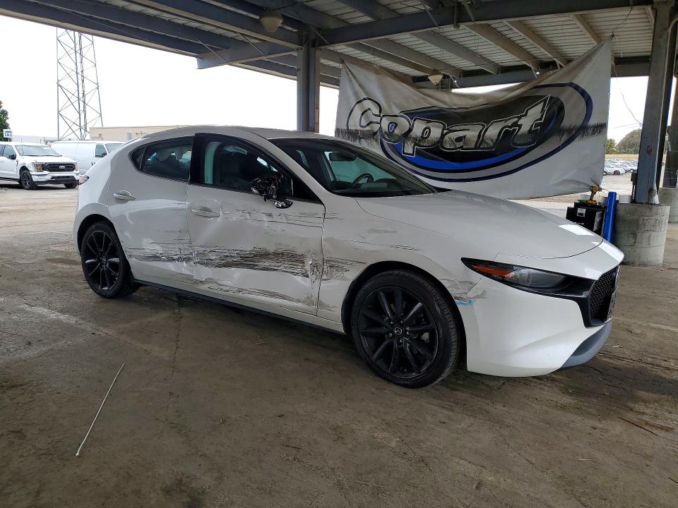 2023 Mazda 3 VIN JM1BPBJY0P1620162 COPART salvage auction — SIDE, Ca - Salvage Certificate, sold $5,300 on 2026-07-02 (photo 4)