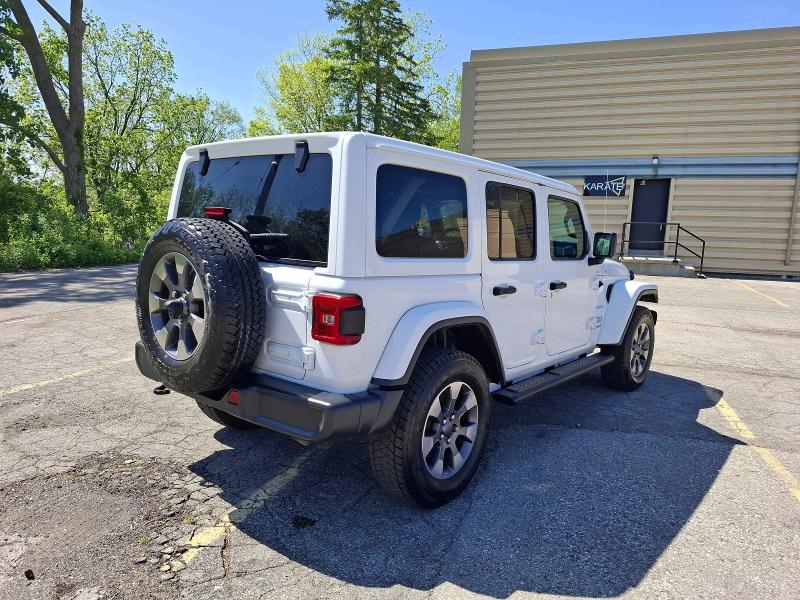 2021 Jeep Wrangler / VIN 1C4HJXEG0MW544094 COPART salvage auction — MINOR DENT/SCRATCHES, On - Permit No Brand - Unfit (P), sold $16,050 on 2026-07-03 (photo 4)