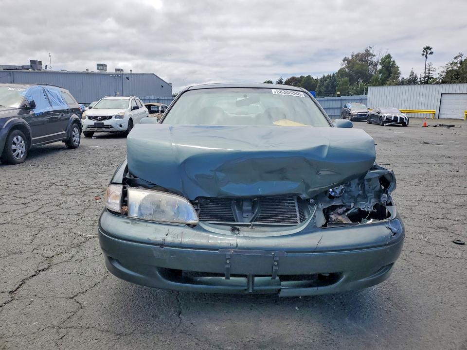1999 Mazda 626 VIN 1YVGF22C3X5853466 COPART salvage auction — FRONT END, CA - SALVAGE CERTIFICATE, sold $100 on 2026-07-02 (photo 5)