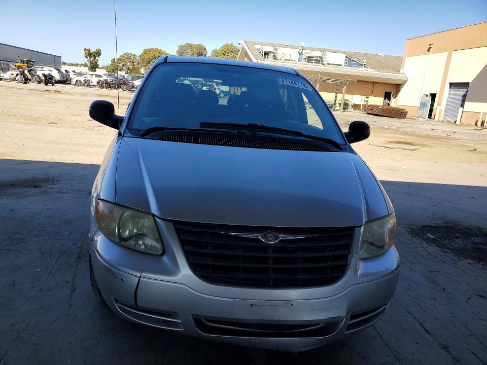 2007 Chrysler Voyager VIN 1A4GJ45R77B113446 COPART salvage auction — SIDE, Ca - Salvage Certificate, sold $175 on 2026-07-02 (photo 5)