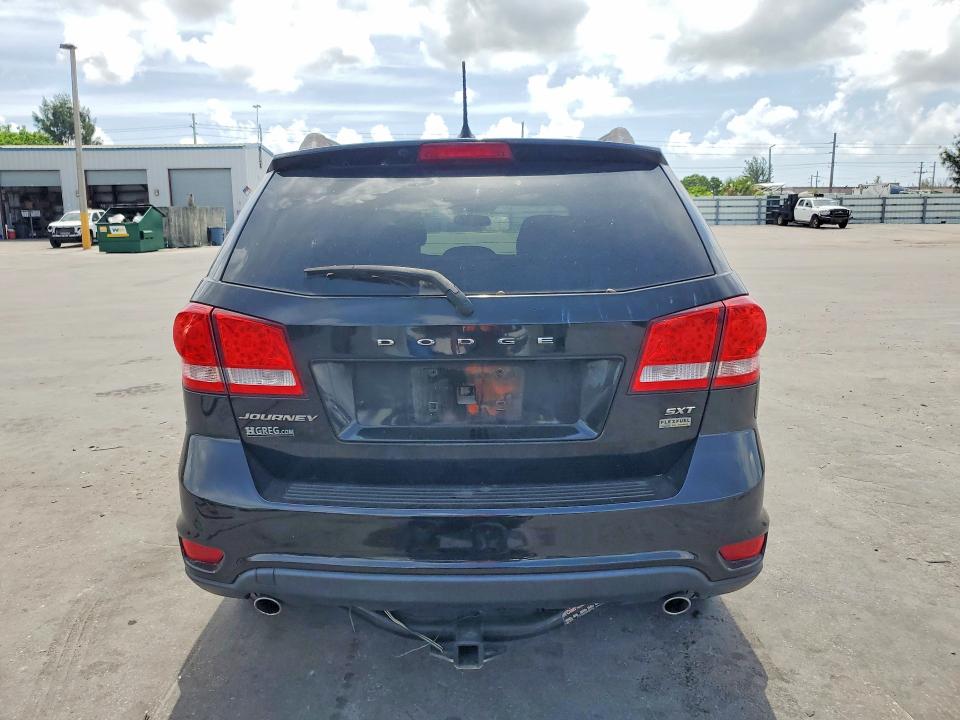 2014 Dodge VIN 3C4PDCBG3ET129097 COPART salvage auction — MINOR DENT/SCRATCHES, Fl - Certificate Of Title, sold $1,250 on 2026-07-03 (photo 6)