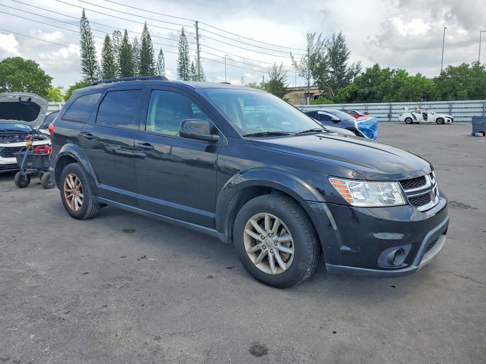 2014 Dodge VIN 3C4PDCBG3ET129097 COPART salvage auction — MINOR DENT/SCRATCHES, Fl - Certificate Of Title, sold $1,250 on 2026-07-03 (photo 4)