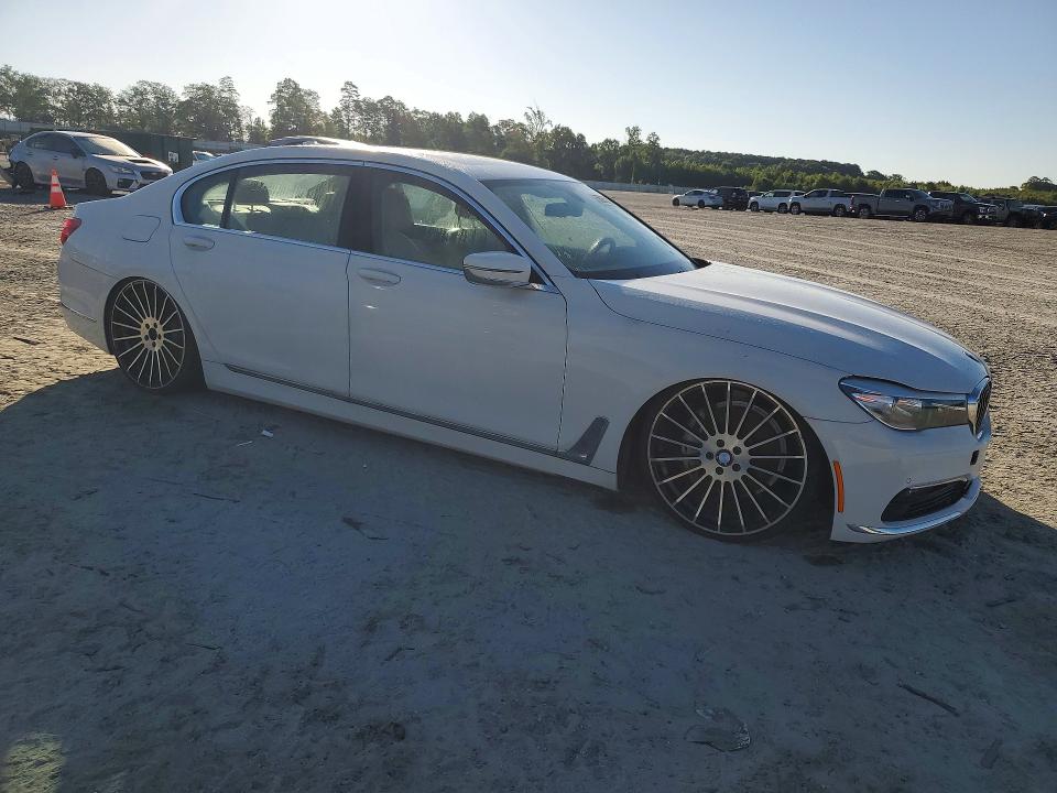 2016 BMW 7 series VIN WBA7E2C57GGD99896 COPART salvage auction — MINOR DENT/SCRATCHES, Nc - Certificate Of Title, sold $4,800 on 2026-07-03 (photo 4)