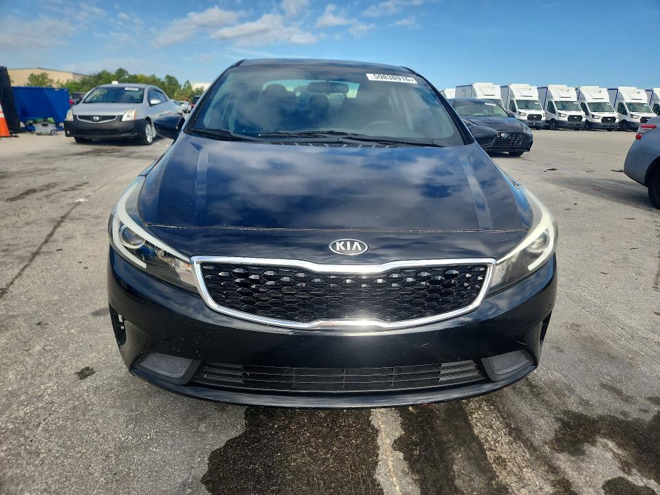 2017 Kia Forte VIN 3KPFK4A75HE110973 COPART salvage auction — MINOR DENT/SCRATCHES, Fl - Certificate Of Title, sold $1,443 on 2026-07-04 (photo 5)