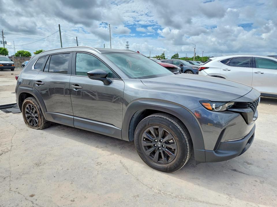 2025 Mazda Cx-50 VIN 7MMVABBM4SN310205 COPART salvage auction — SIDE, Fl - Certificate Of Title, sold $16,400 on 2026-07-02 (photo 4)